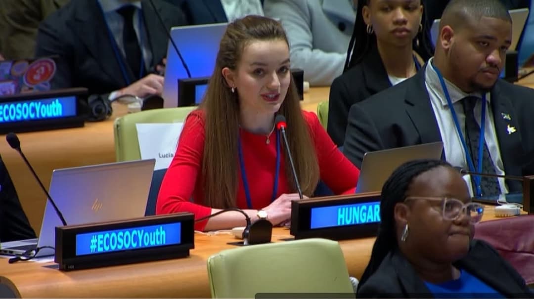 Annamaria speaking behind Hungary's nameplate at the ECOSOC Youth Forum